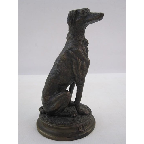 142 - Bronzed figure of a seated greyhound, on circular base, marked F Souchal Paris to base, 17cm high