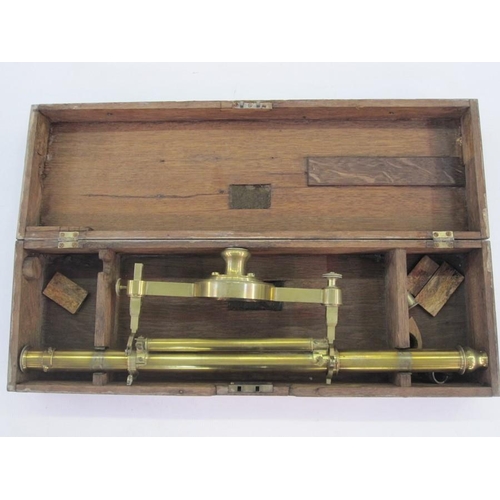 154 - Brass theodolite by G Adams London in wooden fitted case, 53.5cm long