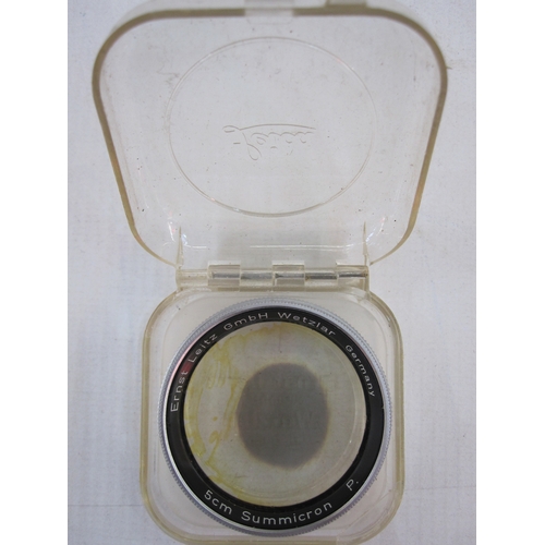 121 - Leica M2-995 442 rangefinder camera, a Summaron lens serial number 1810648, an IROOA lens hood, in b... 