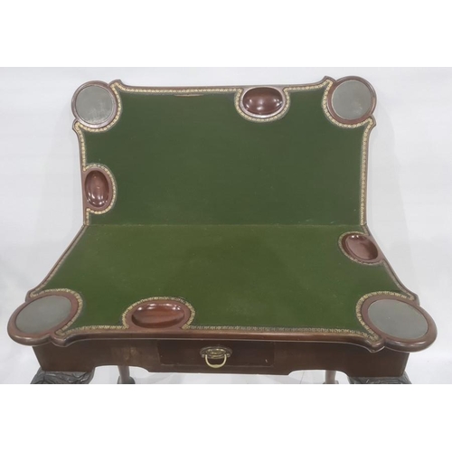 1221A - A George III taste mahogany card table, Irish, the shaped top opening to reveal green baize and dish... 