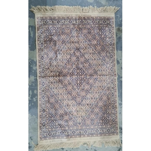 1271 - Small modern rug, diamond pattern in creams, salmons and blues, 107 x 67cm together with a handmade ... 