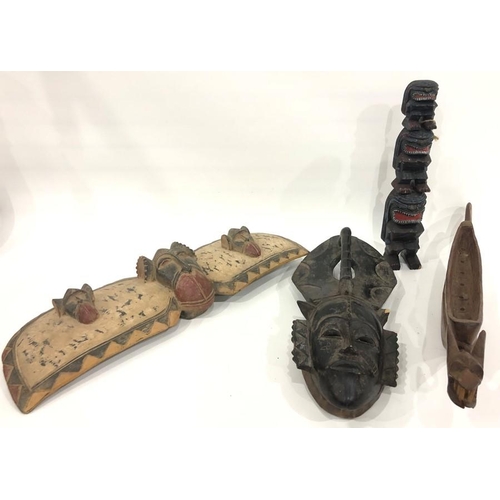 157 - African carved wood mask with headdress, indigenous painted and carved wood model totem pole with th... 