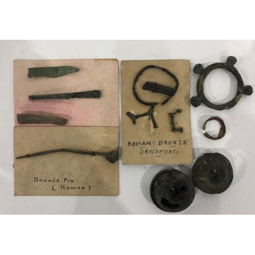 159E - Collection of Roman and Iron Age bronze objects to include terret ring, Roman bronze pin, bracelet, ... 