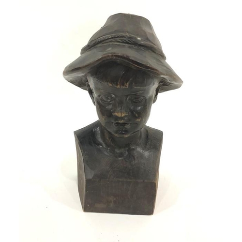 160 - Stained and carved wood bust of a Tyrolean boy, on plinth base, 25cm high