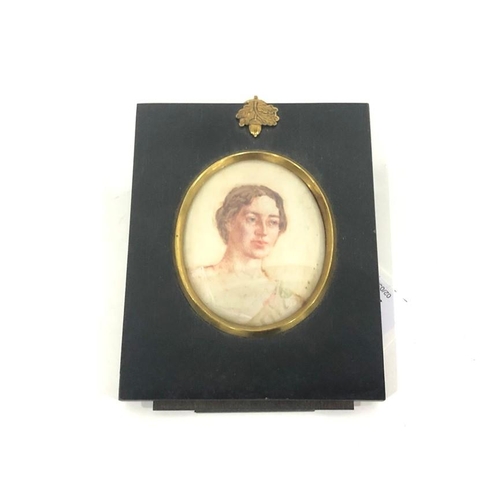 254 - Early 20th century
 Watercolour miniature on ivory
 Head and shoulders portrait of a young lady in w... 