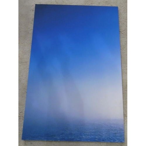 261 - Two modern prints on canvas
 One in two parts of tree in misty sunrise, the other a sea and skyscape... 