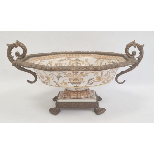 27 - Reproduction gilt metal mounted porcelain pedestal bowl with scroll handles, shaped oval, decorated ... 