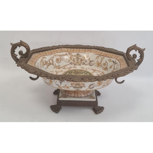 27 - Reproduction gilt metal mounted porcelain pedestal bowl with scroll handles, shaped oval, decorated ... 