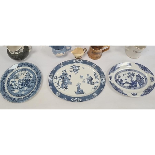 51 - 'Old Willow' pattern oval dish, a blue and white meat plate, a blue and white jug, other Victorian a... 