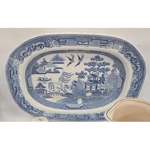 51 - 'Old Willow' pattern oval dish, a blue and white meat plate, a blue and white jug, other Victorian a... 