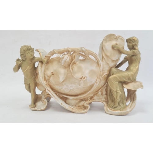 61 - Austrian Royal Dux-style tinted bisque vase, waterlily embossed and supported by pair water nymphs, ... 