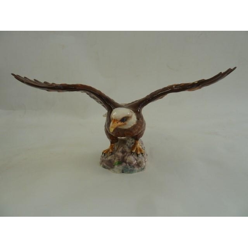 65 - Beswick bald eagle 1018 with bronzed-effect finish, another 1018, golden eagle 2062, Royal Doulton p... 