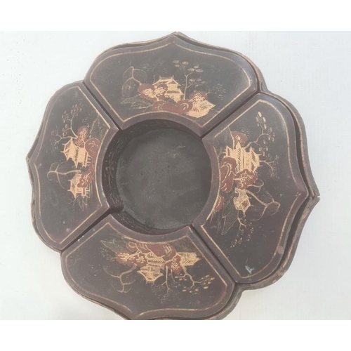 134 - Eastern lacquer ogee shaped circular tray  fitted four lidded shaped boxes, 20cm diameter, three var... 