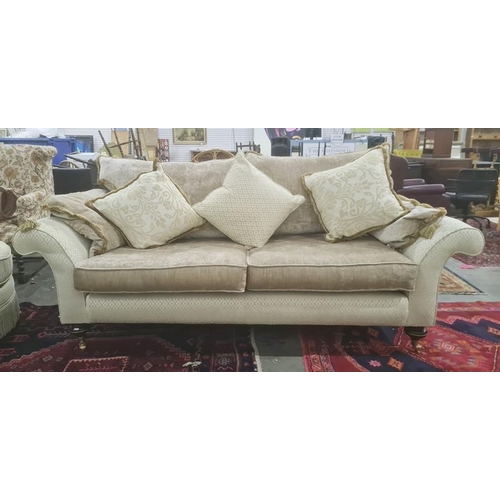 1351 - Lee Longlands three-seater sofa and matching chair in diamond-patterned upholstery, with brown trim ... 