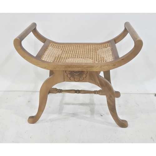 1378 - Cane seated stool on mahogany and saltire stretchered base