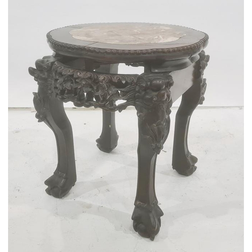 1389 - Chinese marble topped and hardwood framed low table, the shaped top with bead decoration, on carved ... 