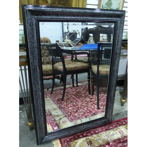 1419 - Modern black painted wall mirror of rectangular form with bevel mirror plate, 110cm x 80cm