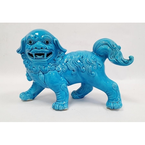 16 - Chinese turquoise glazed model Buddhist lion,18cm high, two various bisque and partly glazed figures... 