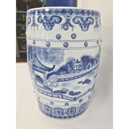 164 - Chinese blue and white barrel seat, the sides decorated with a lake scene and pierced panels, 47cm h... 