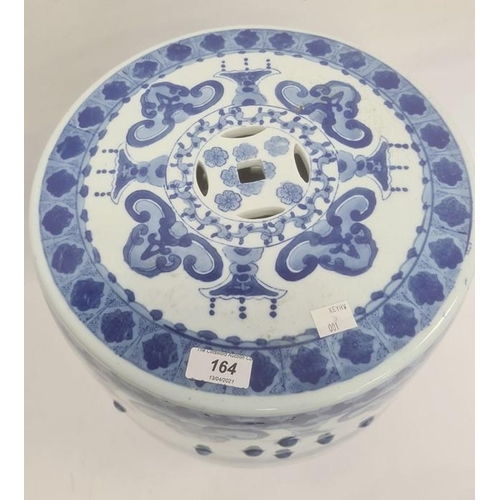 164 - Chinese blue and white barrel seat, the sides decorated with a lake scene and pierced panels, 47cm h... 