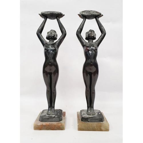 177A - Pair of Limousin bronze Art Nouveau figures of ladies holding aloft baskets of flowers