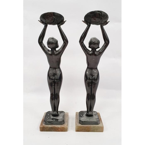 177A - Pair of Limousin bronze Art Nouveau figures of ladies holding aloft baskets of flowers