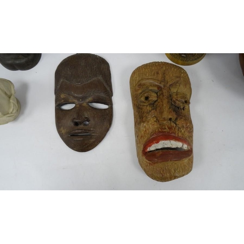 190 - Assorted items including pipe rack, reproduction Sumerian type tablet, masks, treen etc