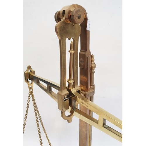 192 - Set of Degrave & Co of London folding brass balance scales, 60cm high