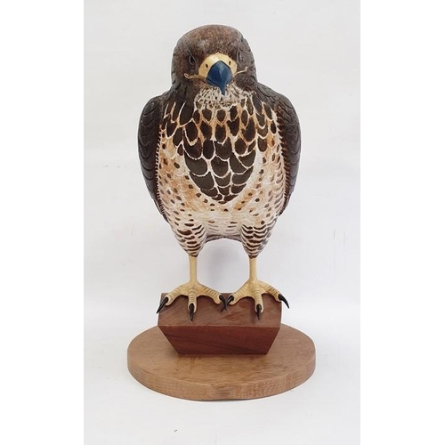 195 - Carved wood figure of bird of prey, marked verso 'B2000 1/1', 42cm high