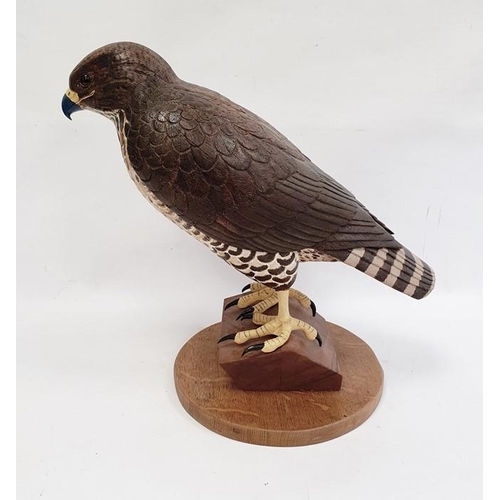 195 - Carved wood figure of bird of prey, marked verso 'B2000 1/1', 42cm high