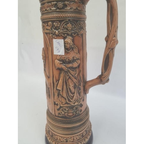 21 - German Gerzit extra large pottery stein, embossed medieval figures and having blue glazed borders, c... 