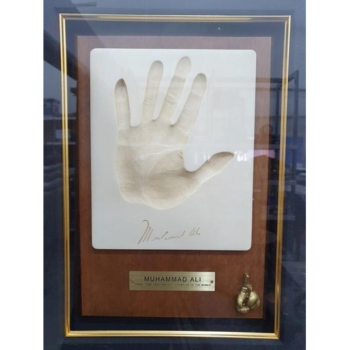 216 - Mohammed Ali framed and glazed photograph, part biography and hand print