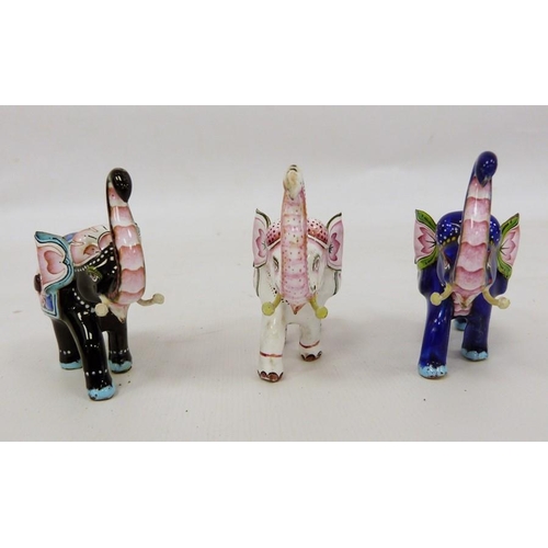 228 - Three 20th century enamel models of elephants, each 6cm high (3)