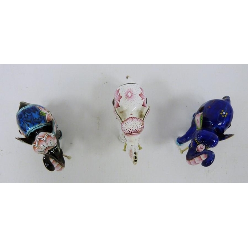 228 - Three 20th century enamel models of elephants, each 6cm high (3)