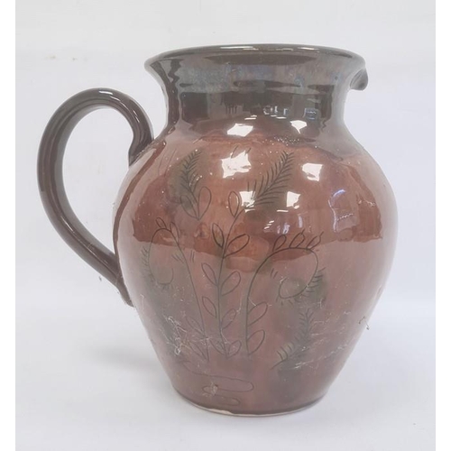 23 - Studio pottery vase, ovoid with treacle brown glaze and line decoration of stylised plants, 26.5cm h... 