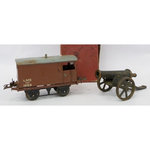 238 - Hornby carriage in box and a model cannon (2)