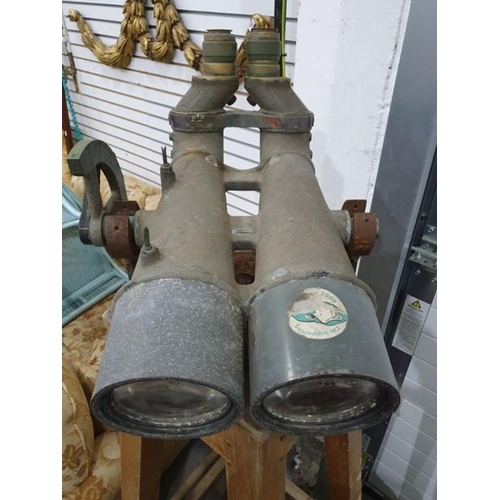 254 - Pair of 20th century, possibly WWII, naval binoculars mounted on wooden base, binoculars unmarked, 5... 