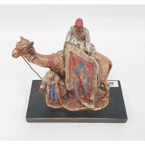 258 - Franz Bergman style coal painted spelter table lighter in the form of Arab carpet seller on camel, 1... 