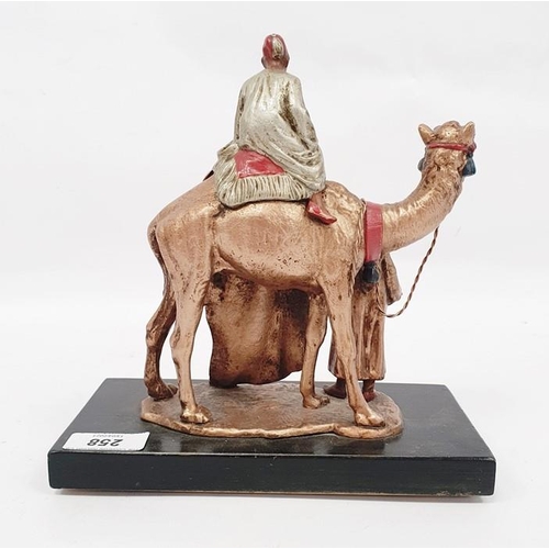 258 - Franz Bergman style coal painted spelter table lighter in the form of Arab carpet seller on camel, 1... 