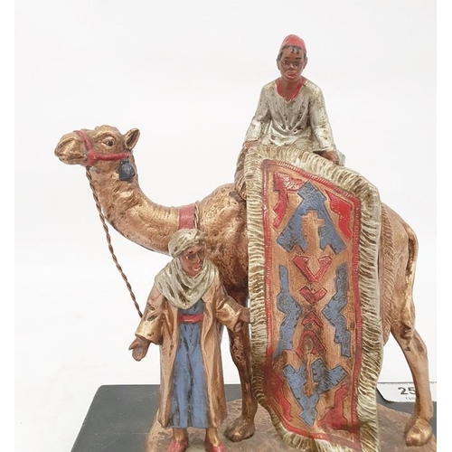 258 - Franz Bergman style coal painted spelter table lighter in the form of Arab carpet seller on camel, 1... 