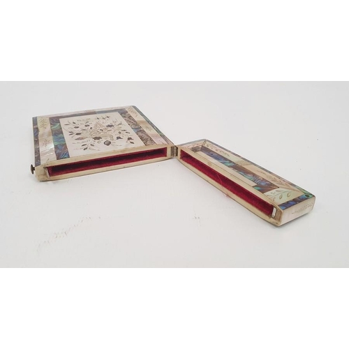 274 - A 19th century mother of pearl and abalone inlaid card case, engraved decoration of peacocks amongst... 