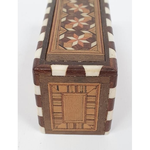 278 - Anglo Indian inlaid boxed set of miniature dominoes with geometric inlaid decoration