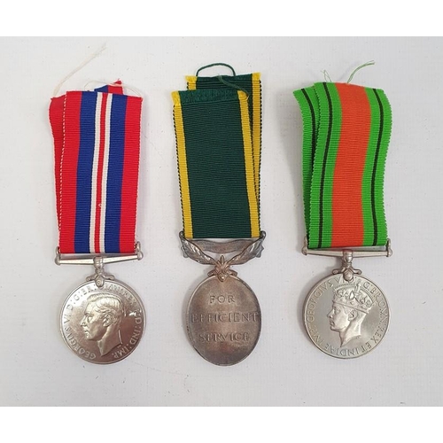 279 - 1939-45 Defence medal, 1939-45 War medal and George VI Territorial Efficient Service medal awarded t... 