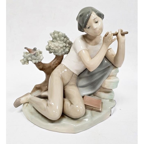 3 - Lladro porcelain figure of boy with flute, 20cm high and another of girl seated with lamb (2)