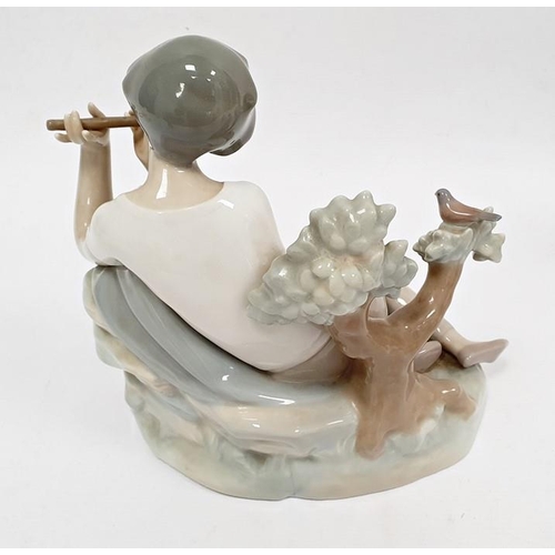 3 - Lladro porcelain figure of boy with flute, 20cm high and another of girl seated with lamb (2)