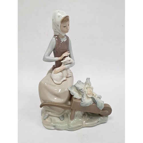 3 - Lladro porcelain figure of boy with flute, 20cm high and another of girl seated with lamb (2)