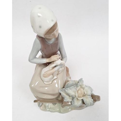 3 - Lladro porcelain figure of boy with flute, 20cm high and another of girl seated with lamb (2)