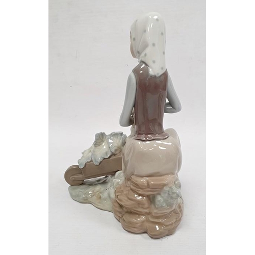 3 - Lladro porcelain figure of boy with flute, 20cm high and another of girl seated with lamb (2)