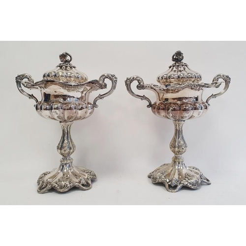 316 - Pair of silver plated two handled lidded pedestal bowls, flower finials, scroll decorated, semi gadr... 