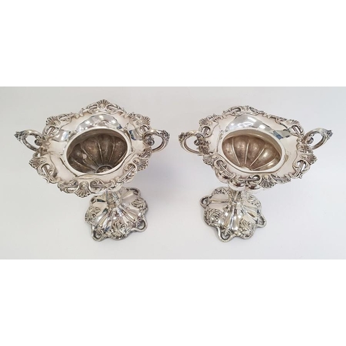 316 - Pair of silver plated two handled lidded pedestal bowls, flower finials, scroll decorated, semi gadr... 